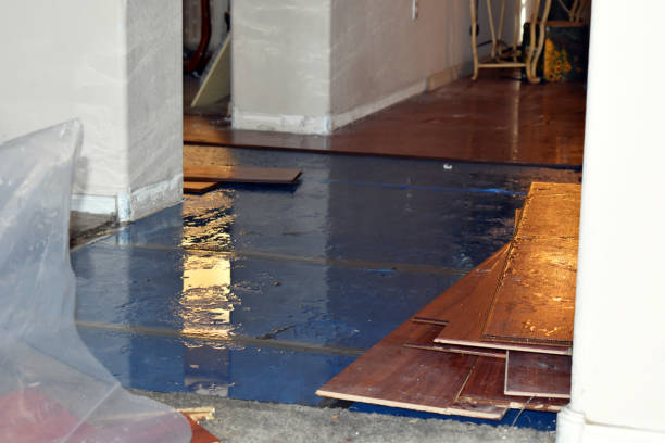 Professional Emergency Water Damage Restoration technician working in Akron, OH